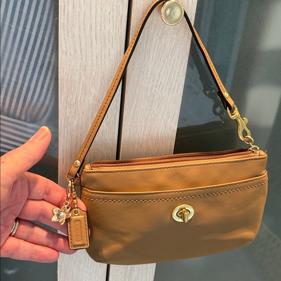 Coach Handbags - Coach Leather Wristlet Holds a Phone EUC